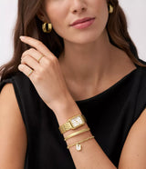 Reloj Raquel de acero inoxidable en tono dorado con tres agujas y fecha ES5220