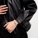 Pulsera UNOde 50 de cadena bañada en plata de ley con cristal verde PUL2495VRDMTL0M