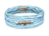 Pulsera doble de seda azul con piezas de bronce PLATADEPALO WB444T